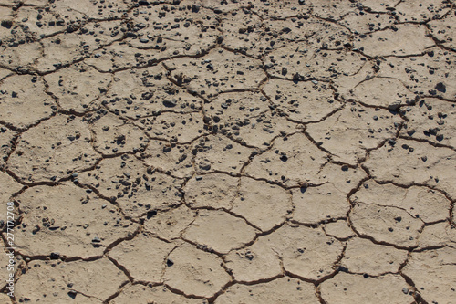 Part of a Huge Area of Dried Land Suffering from Drought - in Cracks