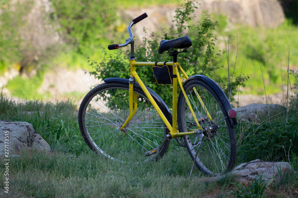 Yellow bike in nature