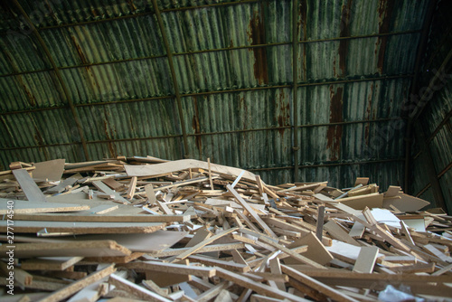 Taking photographs of wood plywood, used for making pellets