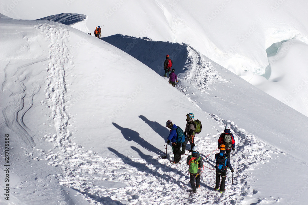 Group of Climbers descend from the Mountain