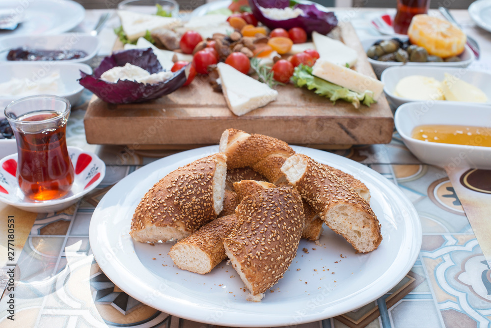 Turkish bagel, tea and Breakfast on the table at the restaurant or cafe in Turkey. Turkish bagel, tea and Breakfast on the table at the restaurant or cafe in Turkey.
