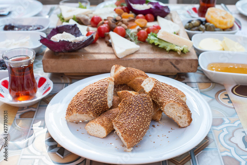 Turkish bagel, tea and Breakfast on the table at the restaurant or cafe in Turkey.