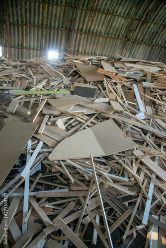 Taking photographs of wood plywood, used for making pellets