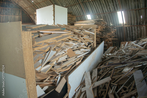 Taking photographs of wood plywood, used for making pellets