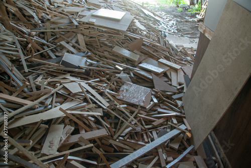 Taking photographs of wood plywood, used for making pellets