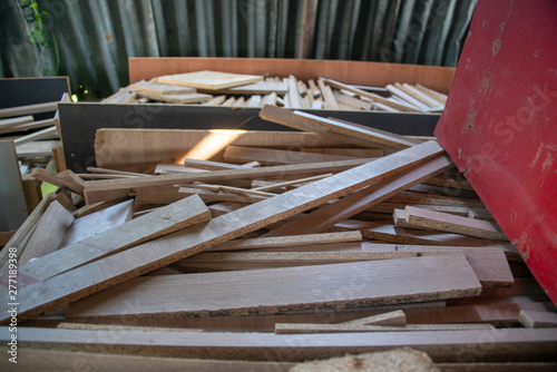 Taking photographs of wood plywood, used for making pellets