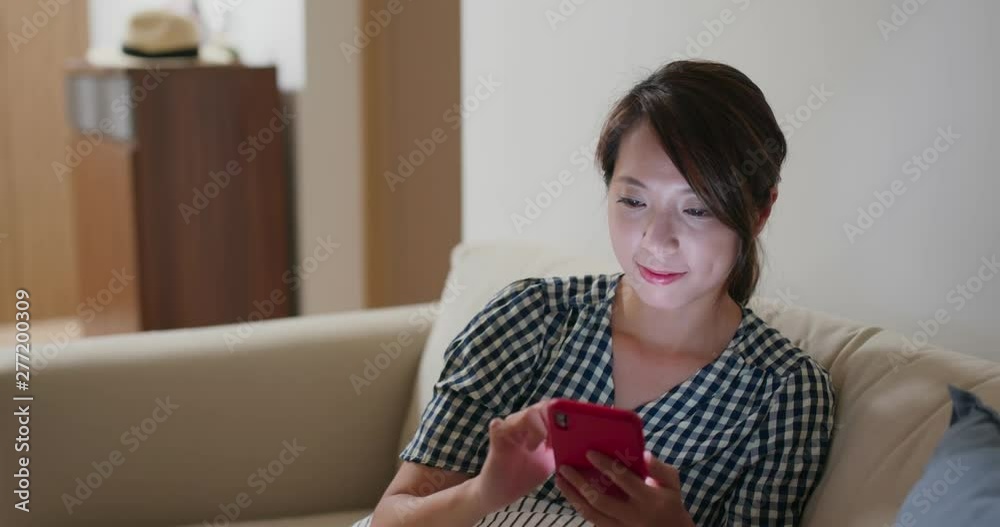 Woman work on mobile phone at home Woman work on mobile phone at home
