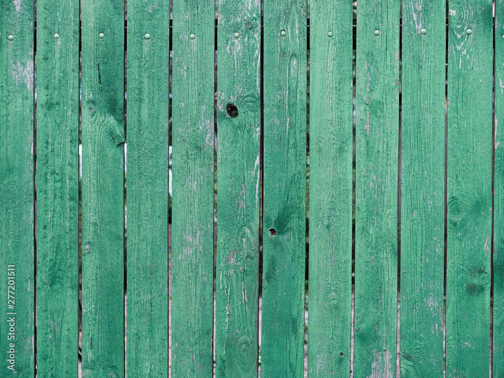 Background texture of old green painted wooden lining boards wall Background texture of old green painted wooden lining boards wall