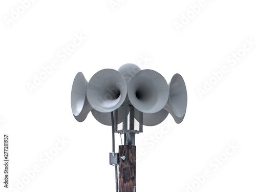 A side view photograph of a several multi directional round electronically amplified emergency siren or noon time horns or speakers on top of a wooden pole in a small town in Wisconsin.