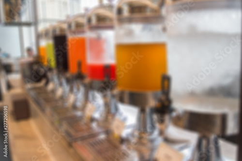 Blurred image for background of line up drink buffet. Juices ready for drink. 