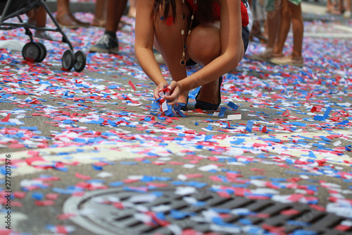 A Girl Gathered Confetti During July 4th Commenmoration