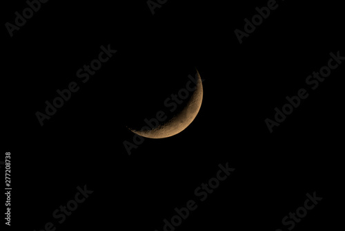 C-shaped section or Crescent of the moon surface that can be seen after sunset with a telescope. (Astronomy, Atmosphere, Science)
