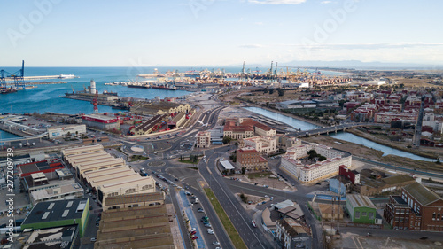 Aerial view of the pier with yachts and boats in the city of Valencia, Spain. Drone photography.