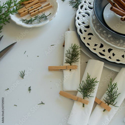 Preparations about arranging the table for winter holidays. Winter decoration, DIY