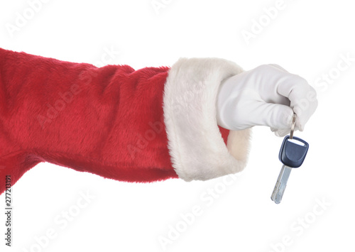 Santa Holding a set of Car keys isolated over white. Hand and arm only