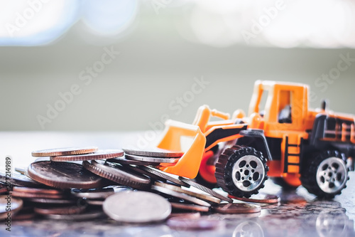 The yellow toy bulldozer wi...