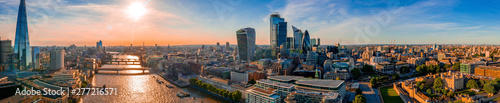Photography London rooftop aerial view at the morning light with urban architectures, modern skyscrapers like the Shard and city of London and Thames River by the Tower Bridge