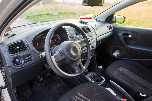 The car inside the driver's seat. The interior of a prestigious modern car