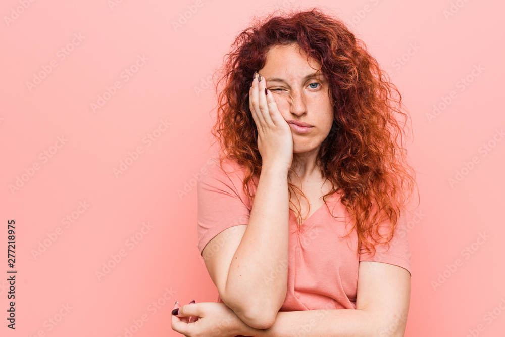 Young natural and authentic redhead woman who is bored, fatigued and need a relax day. Young natural and authentic redhead woman who is bored, fatigued and need a relax day.