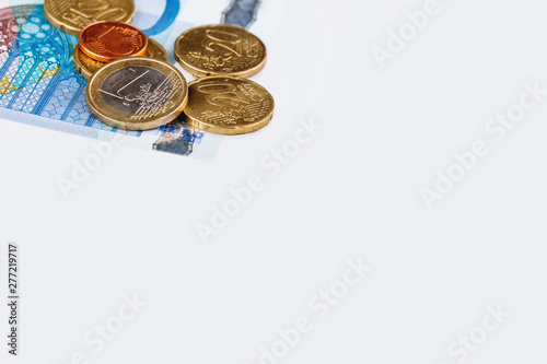 Euro coins and banknotes. European money, official currency of 19 of 28 member states of the European Union. Copy space.