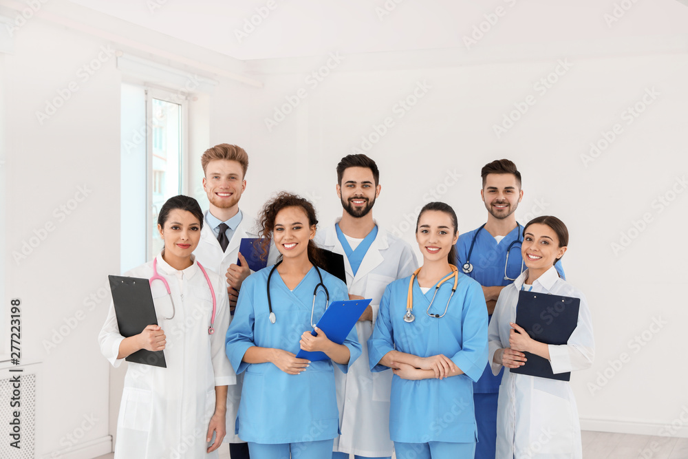 Team of medical workers in hospital. Unity concept Team of medical workers in hospital. Unity concept