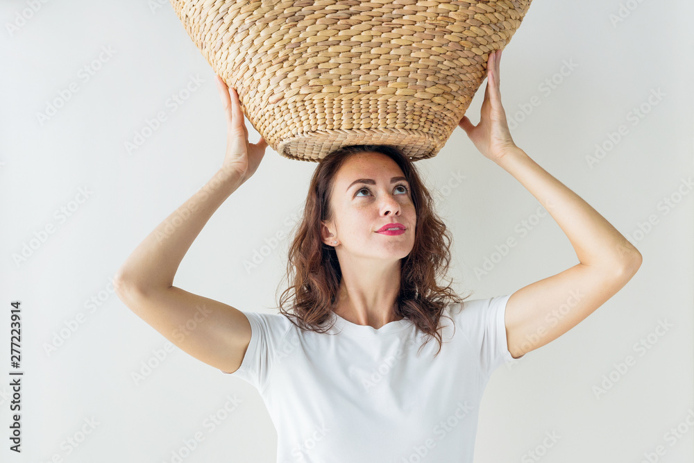 Pretty young woman pastel clothing holding bag Pretty young woman pastel clothing holding bag