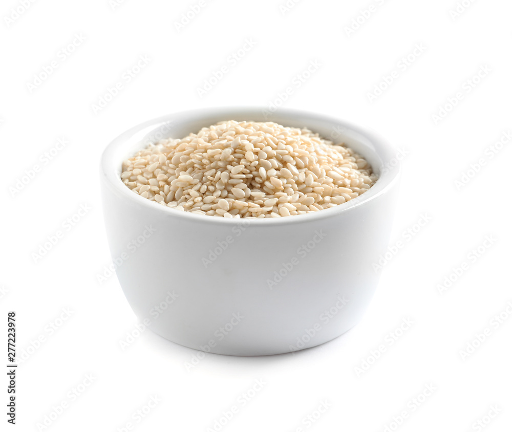Sesame seeds in bowl on white background. Delicious sauce condiment Sesame seeds in bowl on white background. Delicious sauce condiment