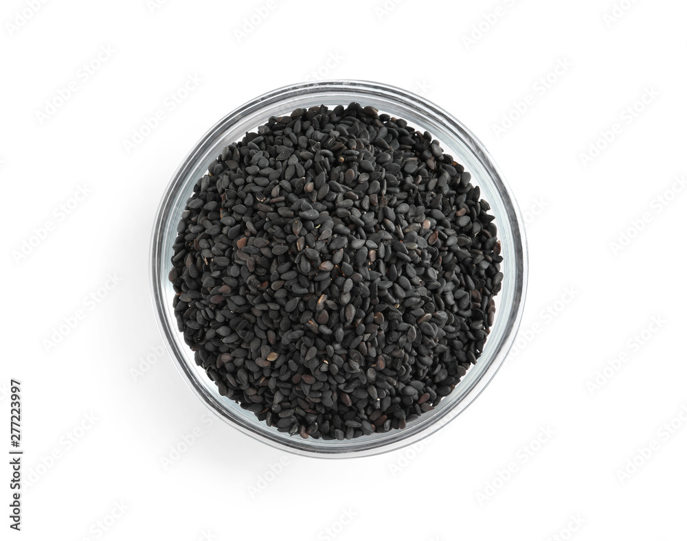 Black sesame seeds in bowl on white background, top view. Delicious sauce condiment Black sesame seeds in bowl on white background, top view. Delicious sauce condiment