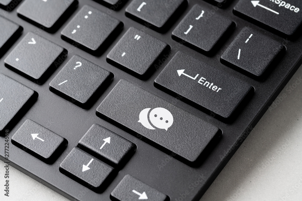Customer service & contact us icon on the cube wood keyboard Customer service & contact us icon on the cube wood keyboard
