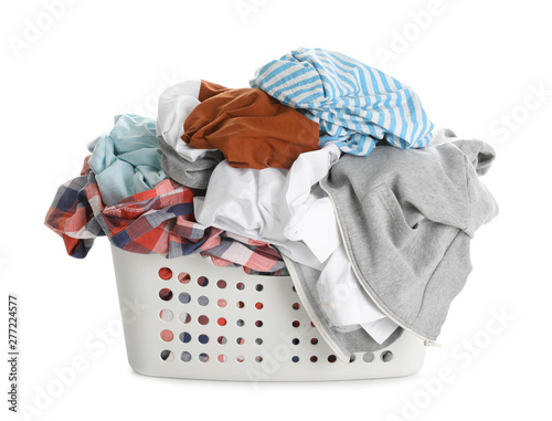 Foto Basket full of dirty laundry isolated on white