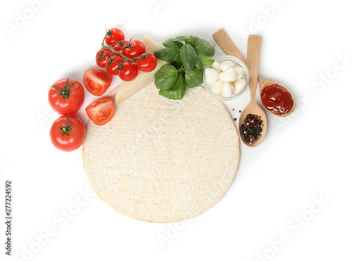 Composition with pizza crust and fresh ingredients isolated on white, top view