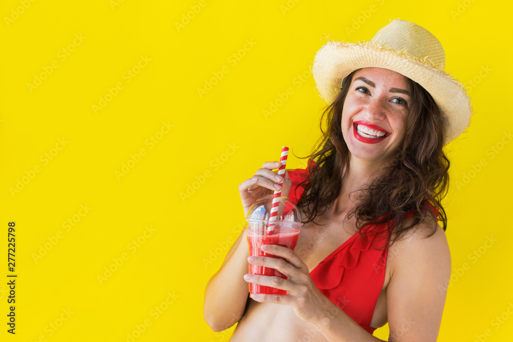 Happy young brunette woman drinks fruit juice Happy young brunette woman drinks fruit juice