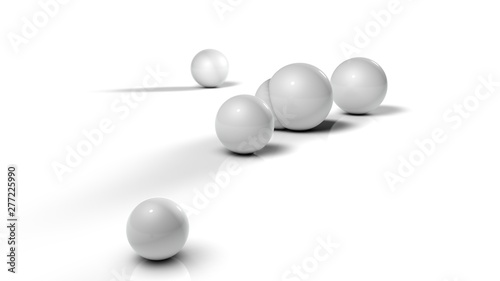 3D illustration of white balls on white reflective background. Balls of different sizes are rolled in different directions. Futuristic image for background and desktop 3D rendering with depth of field