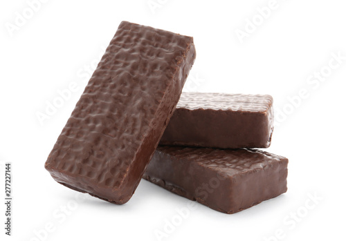 Delicious wafer sticks with chocolate coating isolated on white