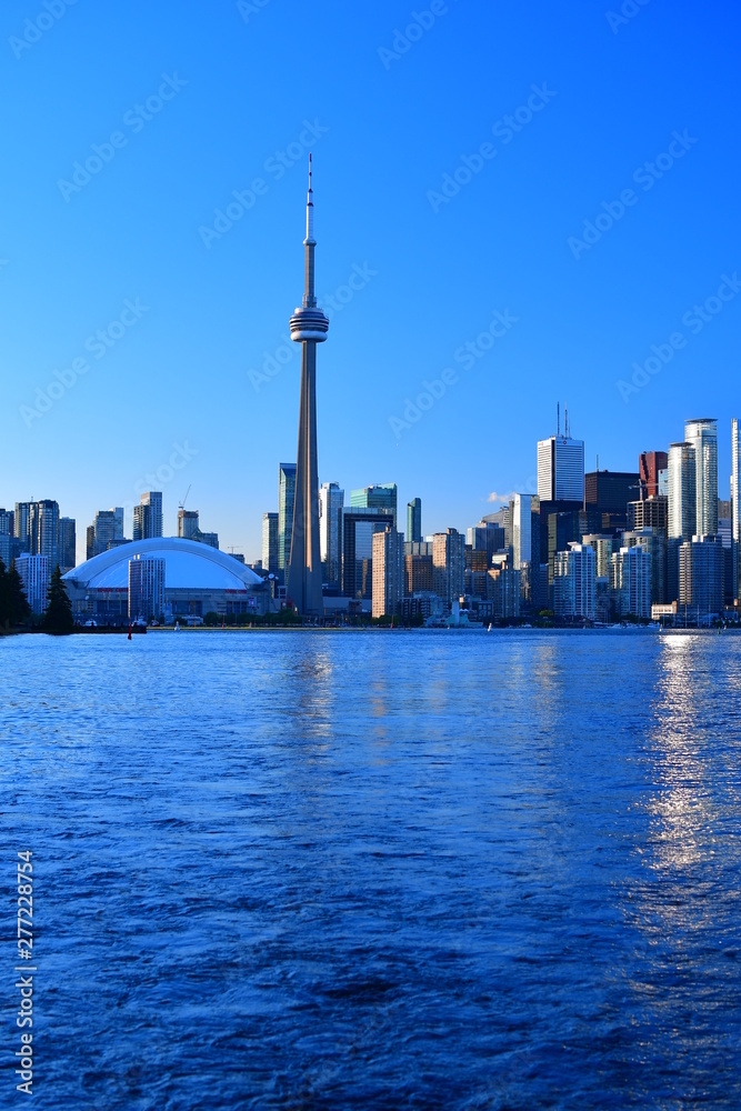 Skyline of Toronto, Canada as seen from the harbor on a summer evening
