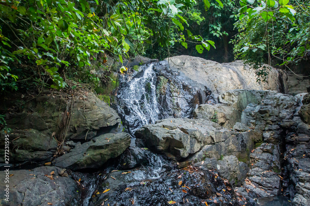 Ton Aow Yon Waterfall rich natural resources,in the forest,asia tropical areaat Island Phuket Thailand. Ton Aow Yon Waterfall rich natural resources,in the forest,asia tropical areaat Island Phuket Thailand.