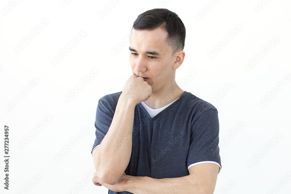 Process, problem, people concept - young man thinking about problem Process, problem, people concept - young man thinking about problem