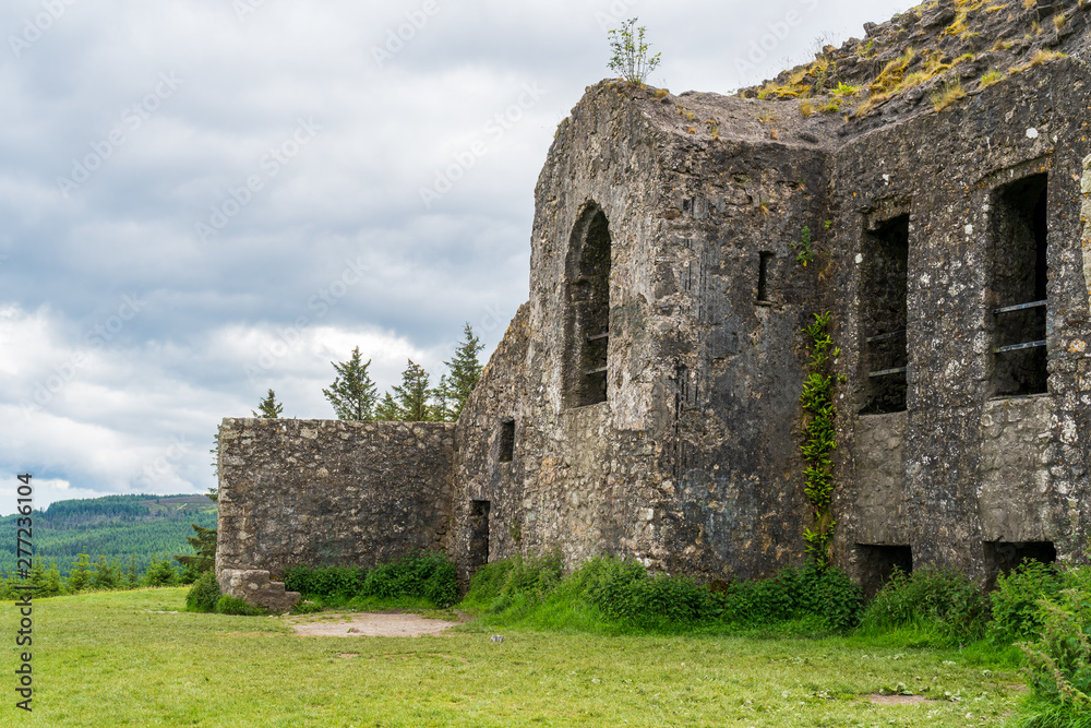 The ruins of the iconic HellFire Club on Montpelier Hill in Dublin, Ireland, a very popular site for Irish walkers, a place of mystery and horror stories, on a summer day, side view.
