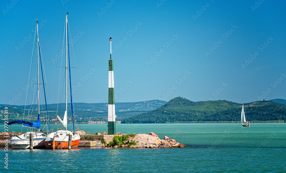 Sailboats in the port on lake Balaton in summer