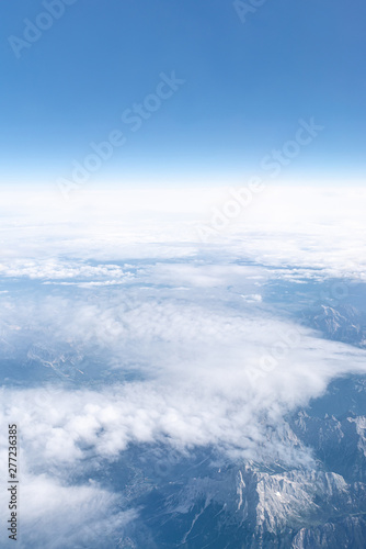 Clouds over Alps mountains  above the clouds  Europe