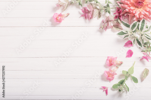 Fototapeta Naklejka Na Ścianę i Meble -  beautiful flowers on white wooden background
