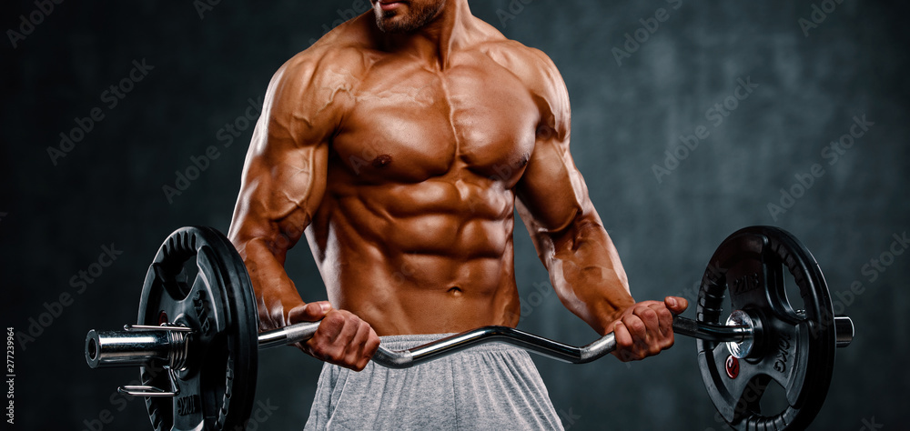 Muscular Men Lifting Weights. Studio Shot Muscular Men Lifting Weights. Studio Shot