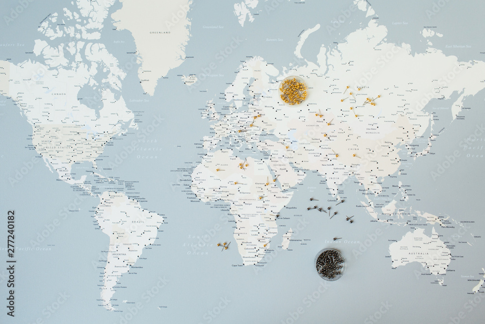 World map with pins. Flat lay travel planning composition. - obrazy, fototapety, plakaty 