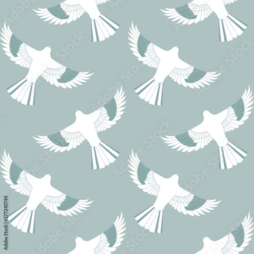 Blue mockingbird Seamless Pattern. This is a white, green, and blue repeat pattern inspired by mockingbirds and geometric lines. You can enjoy this on packaging, wallpaper, or backgrounds. photo