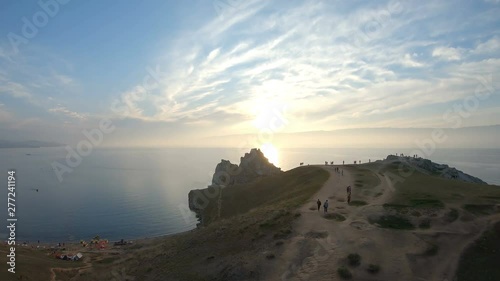 Aerial view of lake Baikal symbol, cape Burkhan at sunset. Olkhon island