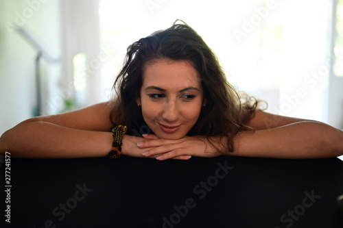Cute and relaxed student girl chilling at home