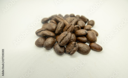 Fototapeta Naklejka Na Ścianę i Meble -  Coffee beans on a light background