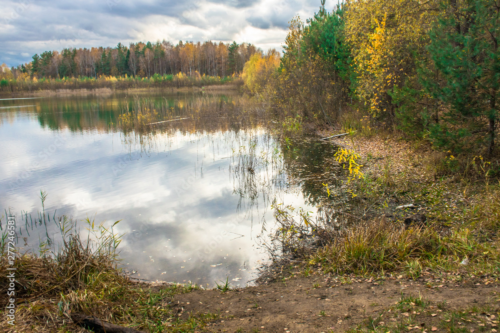Beautiful forest lake old quarry rainy and gloomy autumn day Beautiful forest lake old quarry rainy and gloomy autumn day