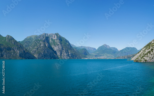 Beautiful panoramic view of Lago Di Garda coastline. Riva Del Garda and Nago-Torbole towns, Italy © Olga