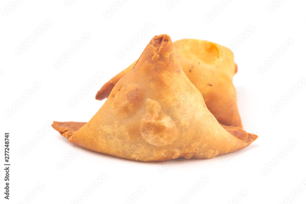 Meat Filled Samosas Isolated on a White Background Meat Filled Samosas Isolated on a White Background